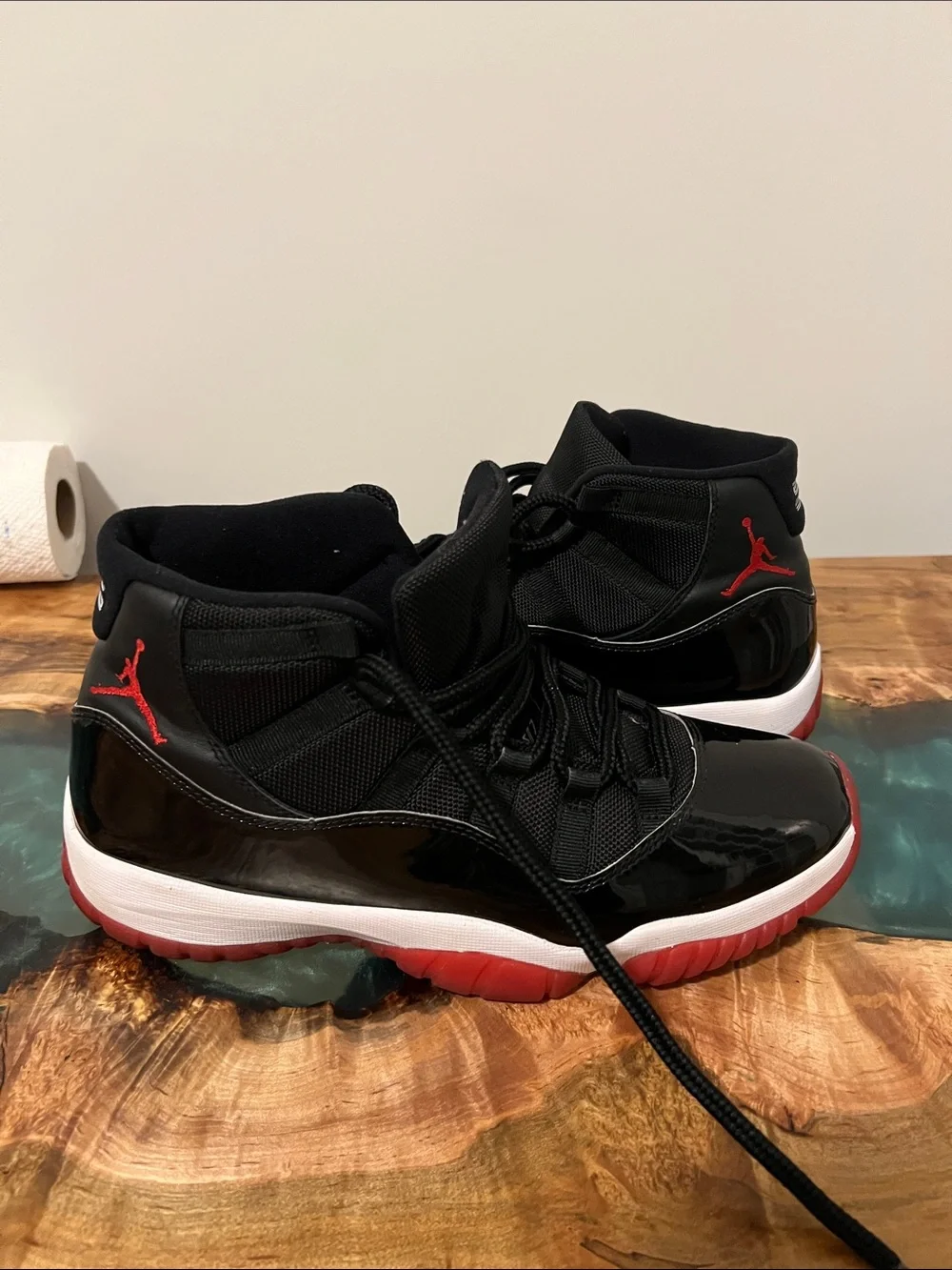 Jordan 11 Retro Playoff Bred Black and Red High-Top Sneakers